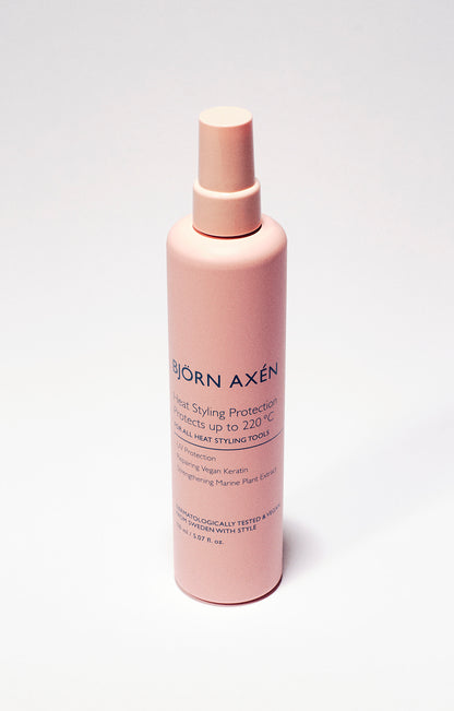 A spray that nourishes the hair while providing heat and UV protection