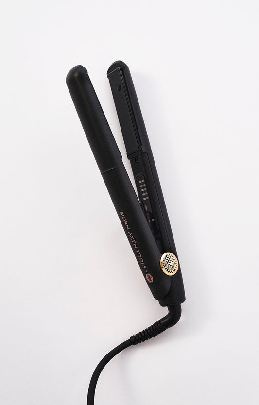 A versatile tool that both straightens and curls the hair 