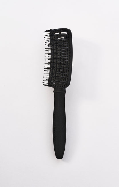 A detangling and styling brush in one